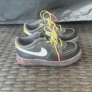 Kids Nike Air Forces with reflective swosh